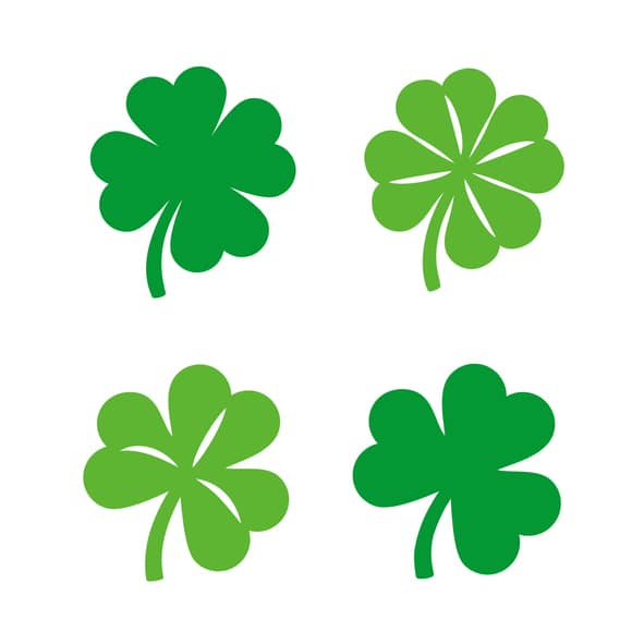 Shamrock icons. Four lucky clover images on a white background.