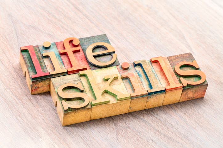 life skills - word abstract in letterpress wood type printing blocks