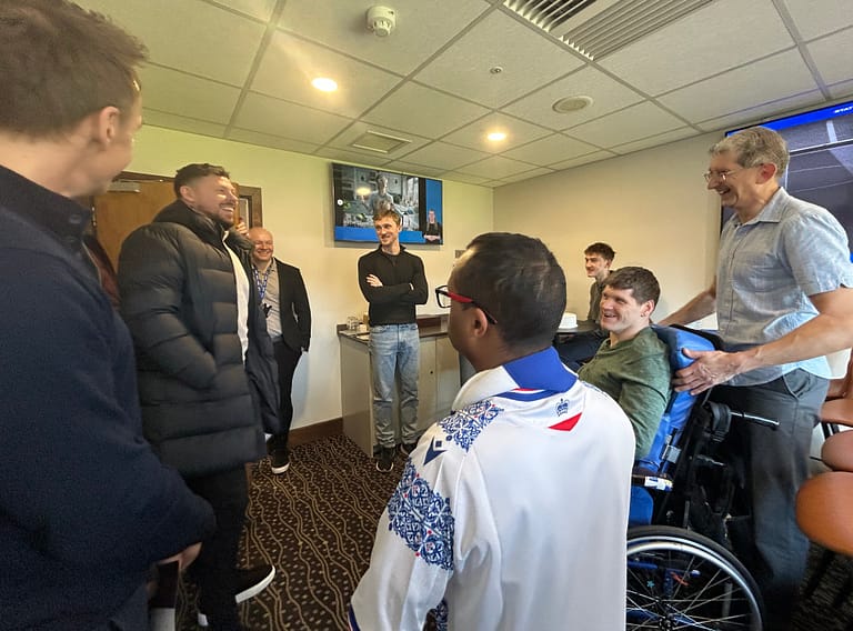 Former footballer Simon Church chats to fans in John Sykes's VIP box